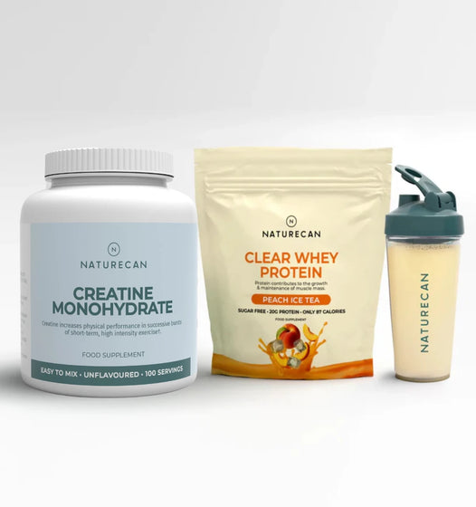 Naturecan creatine monohydrate supplement, clear whey protein package, and shaker bottle on a white background