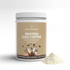 Naturecan Protein Iced Coffee container with a scoop of powder on a light gray background
